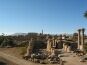 An overview of the Karnak complex with the West Bank of the Nile in the distance.